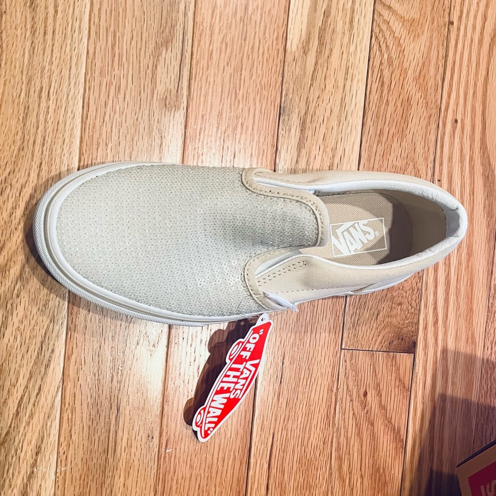Vans slip-ons.  NTW and original packaging. Light tan w/ clear sequins! Size 3.
